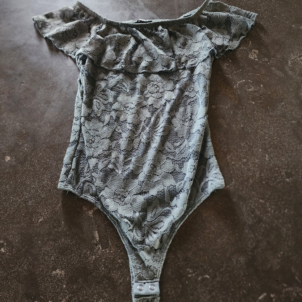 Women's Express XS bodysuit. No tags but never worn. Gray Lace fully lined.